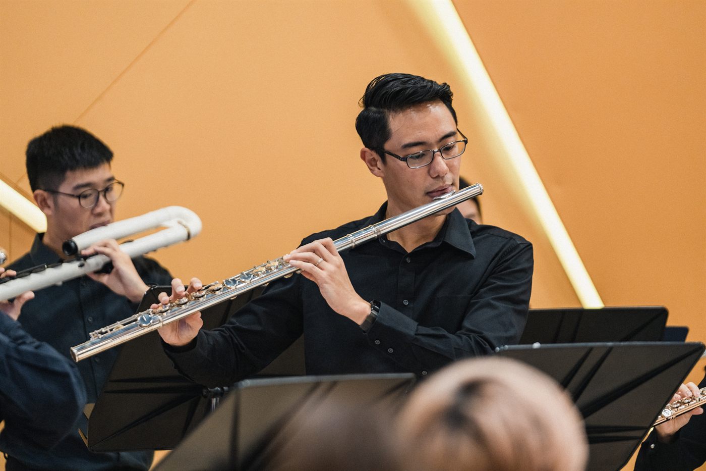 An alto flute with a straight headjoint played in King's Flute Choir