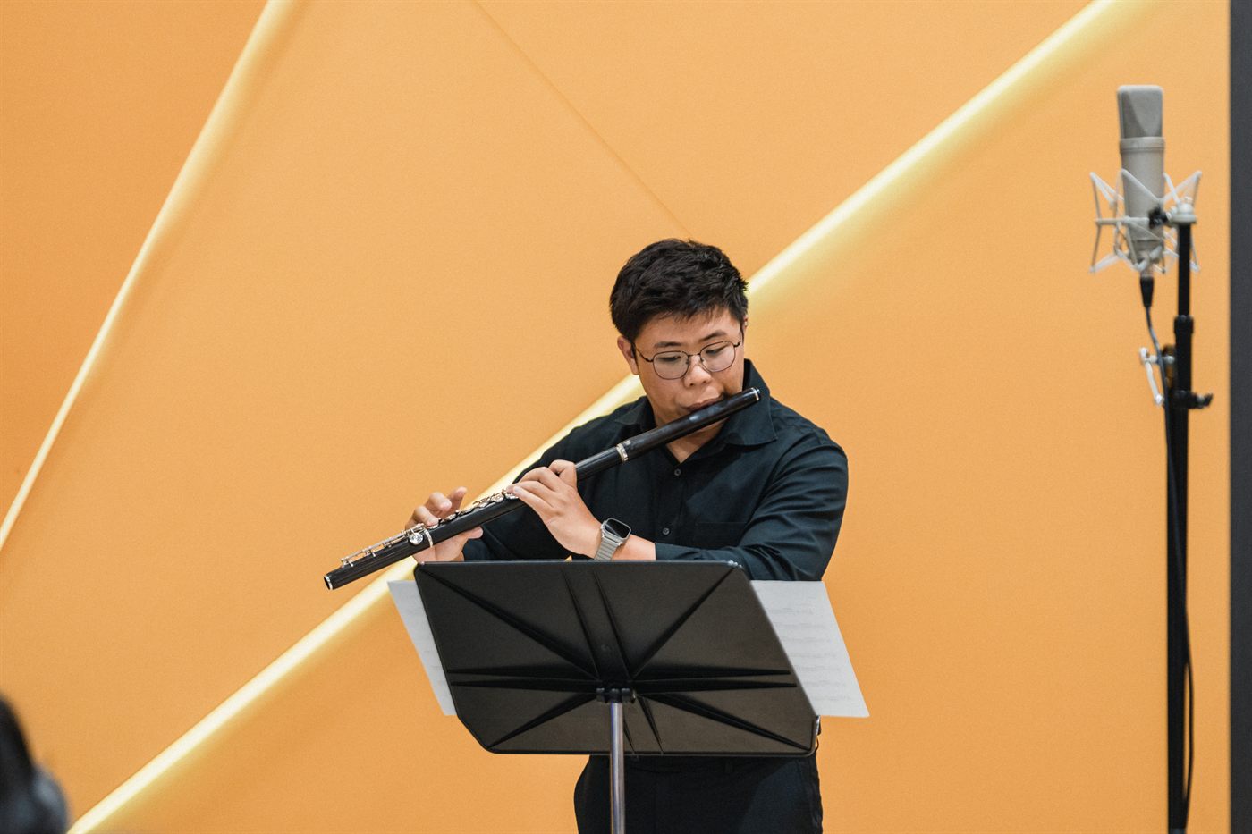 A wooden-bodied concert flute played in King's Flute Choir
