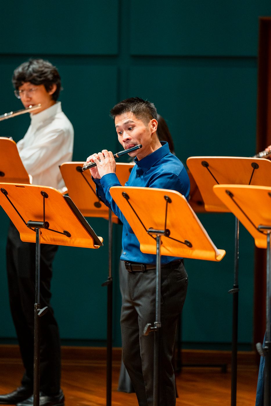 A King's Flute Choir musician playing the piccolo
